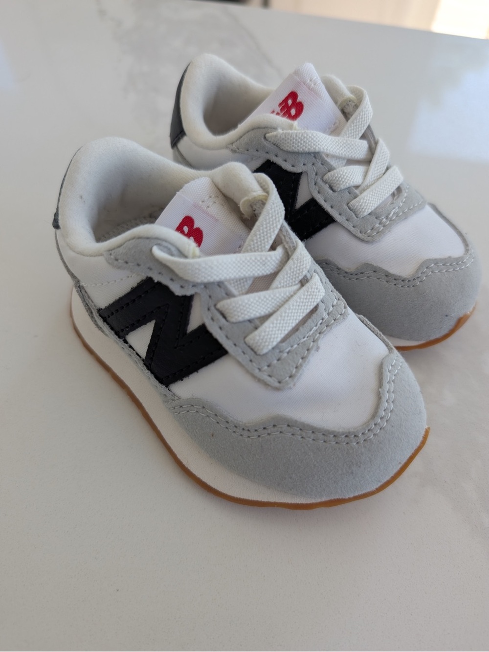 New Balance Kids White, Gray & Black Mini Sneakers